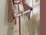 The Enchantment of a Pink Cheongsam for a Traditional Engagement Ceremony