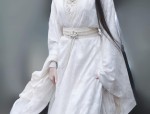 The Elegance of a Qipao with its Accompanying Cape
