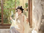 The Enchanting Charm of the Qipao:The Dance of the Dragon and the Grace of the Clear Shadow