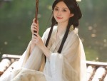 The Elegance of a Half-Qipao Blouse:A Fashionable Journey Through Traditional Beauty