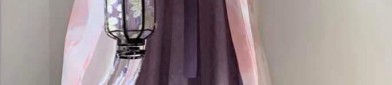The Origin and Evolution of the Round-necked Robe in Traditional Chinese Hanfu Fashion