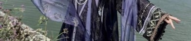 Ethereal Elegance of Traditional Hanfu Headwear with Cascading Tassel Detail