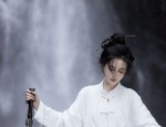 The Grace of Mid-Length Silk Cheongsam:A Noble Elegance