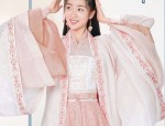The Charm of Miniature Gorges in Traditional Gown Costumes