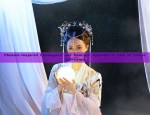 Phoenix-Inspired Cheongsam and Peacock Splendor:A Tale of Cultural Fusion