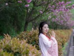 The Youthful Beauty in a Long-sleeved Cheongsam