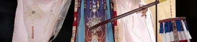 The Charm of Cheongsam with Long Overcoat and Open Cardigan