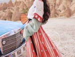 Baby with a Horseface Skirt and Headwear:A Cultural Blend of Fashion