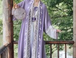 The Elegance of Cheongsam with an Overcoat of a Cape:A Cultural Exploration