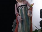 The Enchantment of a Pink Cheongsam in Satin Fabric