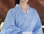 The Enchantment of Red Checkered Qipao:A Cultural Journey