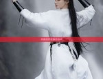 The Charm of a Petite Woman in a Medium-Length Cheongsam