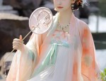 The Enchanting Beauty of a Blue Ancient Hanfu Costume Girl