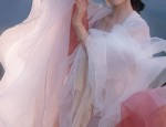 The Elegance of Cheongsam with an Overcoat of a Cape:A Cultural Exploration