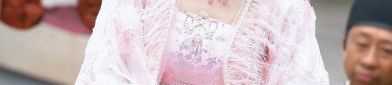 Traditional Elegance in a Childs Tang Suit and Cheongsam Dress