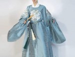 The Ethereal Charm of a Golden Yellow Hanfu with a Camisole