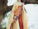 The Ethereal Performance of Guzheng with the Traditional Horseface Skirt