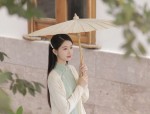 The Enigma of the Pink Cheongsam Woman