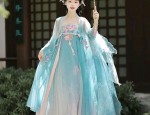 Orange-Red Revamped Cheongsam:A Fashionable Journey Through Traditional Elegance