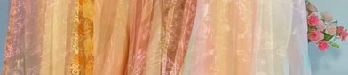 The Enchantment of Hooded Cape and Puff-skirt:A Fashionable Fusion of Traditional Elegance