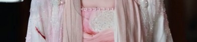 A Glance at the Elegance of a Pink Cheongsam in Satin Fabric