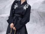 A Black V-neck Jacket with a Horseface Skirt