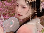 The Elegance of a Qipao with its Accompanying Cape