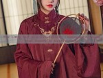 The Little Girl in a Fan-Adorned Cheongsam:A Traditional Beauty in Modern Times