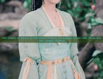 Red Bamboo Quip and Cheongsam:A Blend of Tradition and Modernity