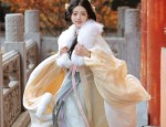 The Art of Styling a Shawl with a Black Cheongsam