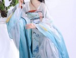 The Ethereal Performance of Guzheng with the Traditional Horseface Skirt
