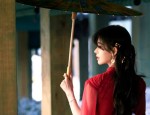 Ethereal Splendor:The Glass-like Hanfu,Spiral Beads,and the Golden Garuda