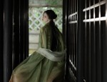 The Enchantment of Red Checkered Qipao:A Cultural Journey