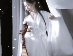 The Charm of Medium-Length Sleeve Cheongsam Blouses:A Traditional Elegance
