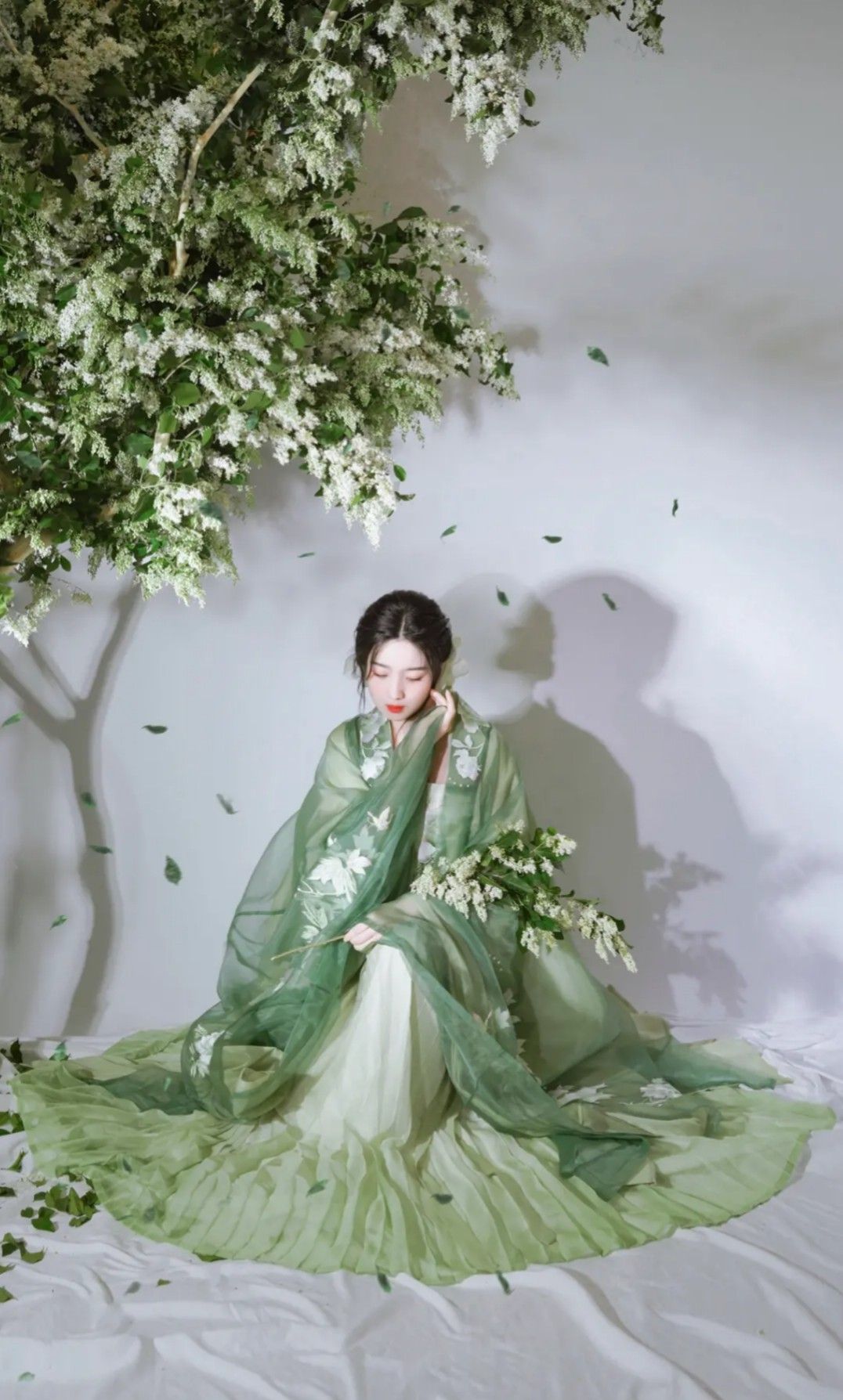 The Elegance of White Cheongsam with an Outer Layer The Elegance of White Cheongsam with an Outer Layer