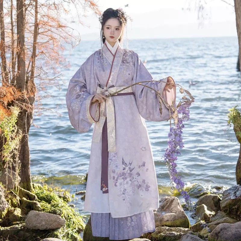 Little Girl in Traditional Tang-Style Hanfu Costume in Summer Little Girl in Traditional Tang-Style Hanfu Costume in Summer