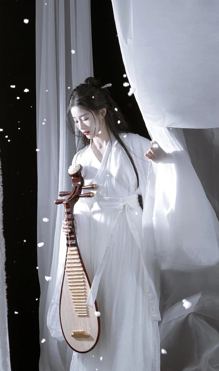 The Charm of Medium-Length Sleeve Cheongsam Blouses:A Traditional Elegance The Charm of Medium-Length Sleeve Cheongsam Blouses:A Traditional Elegance