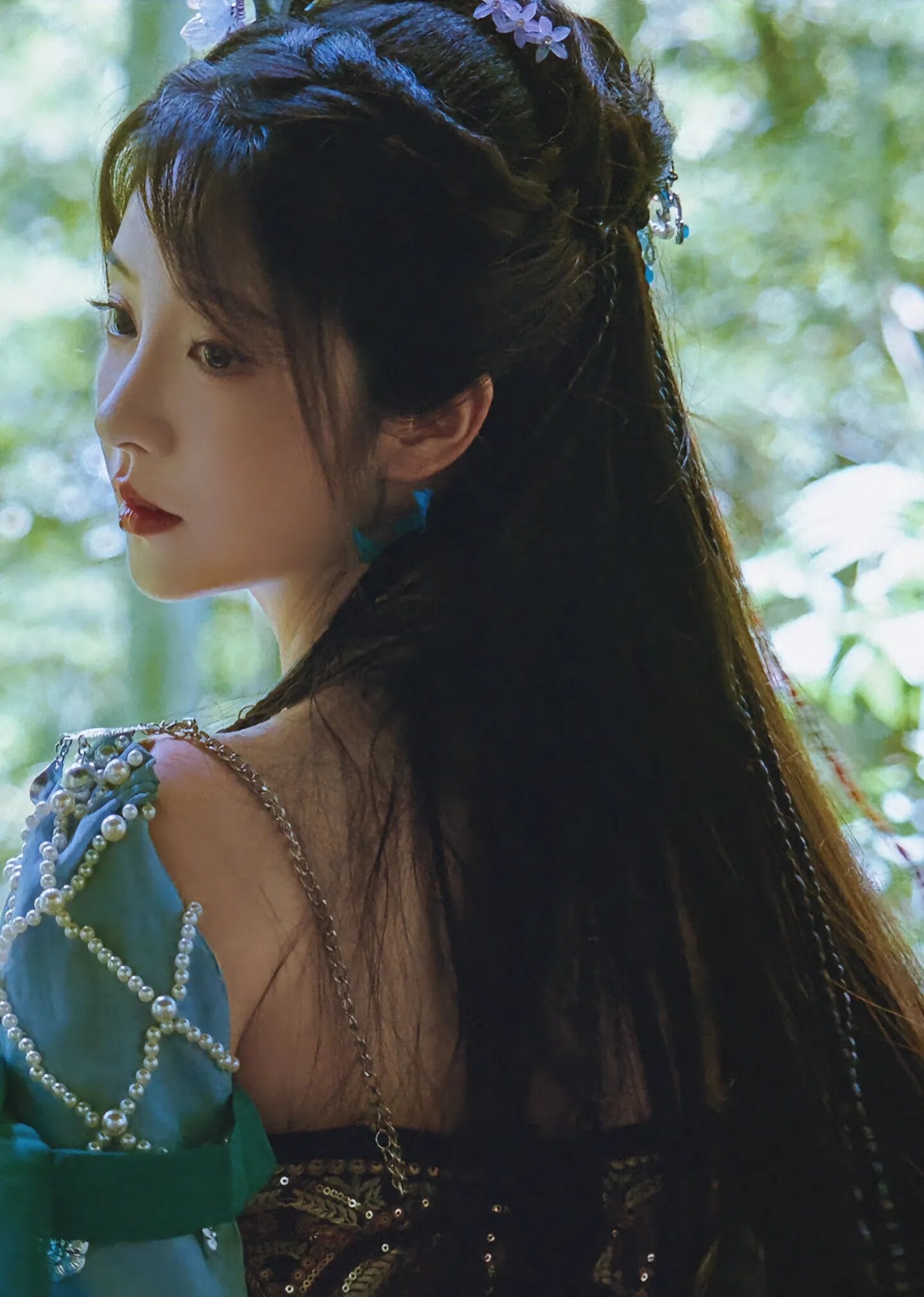 The Enchantment of a Blue Cheongsam Girl The Enchantment of a Blue Cheongsam Girl